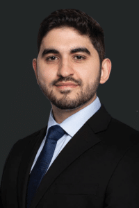 Professional headshot of Jake